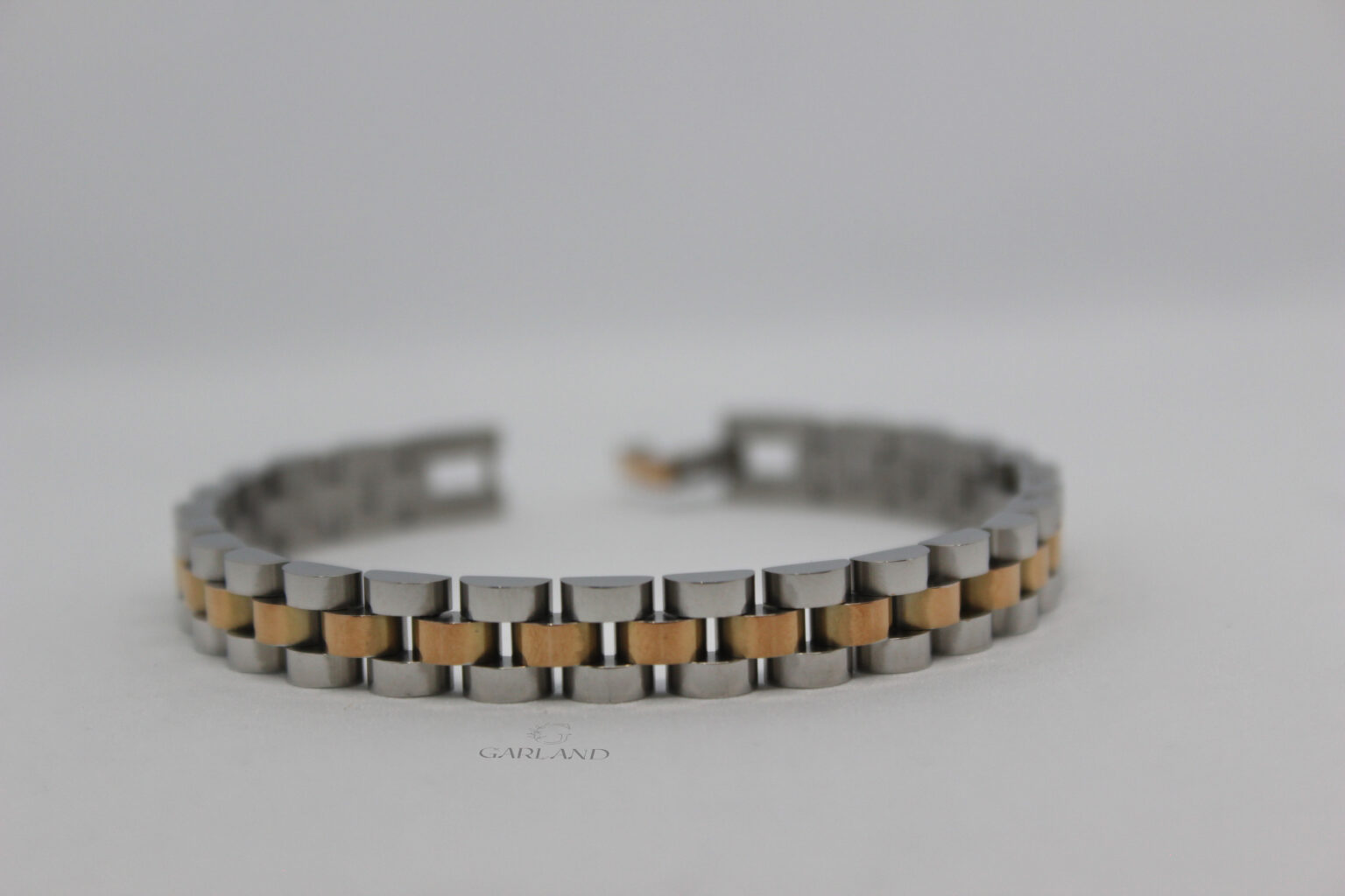 צמיד רוז גולד וכסף חוליות גבר סטיל